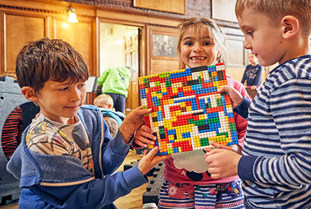 Children playing with LEGO® bricks
