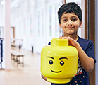 Child with LEGO® head at SuperCamps