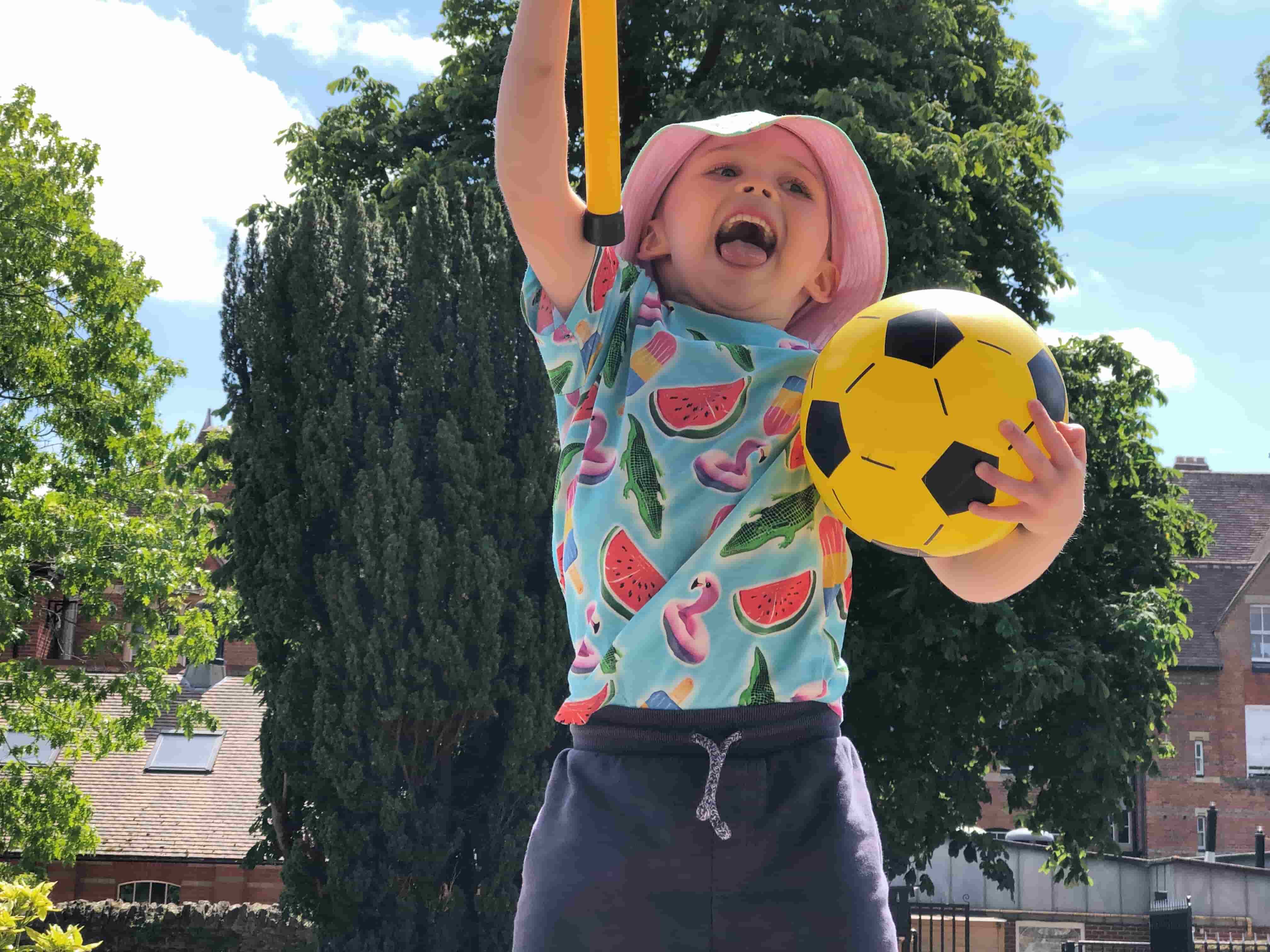 Child playing with a ball