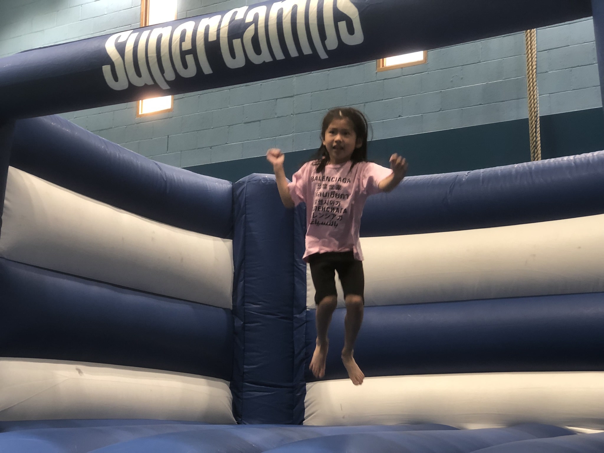 Child jumping on a bouncy castle